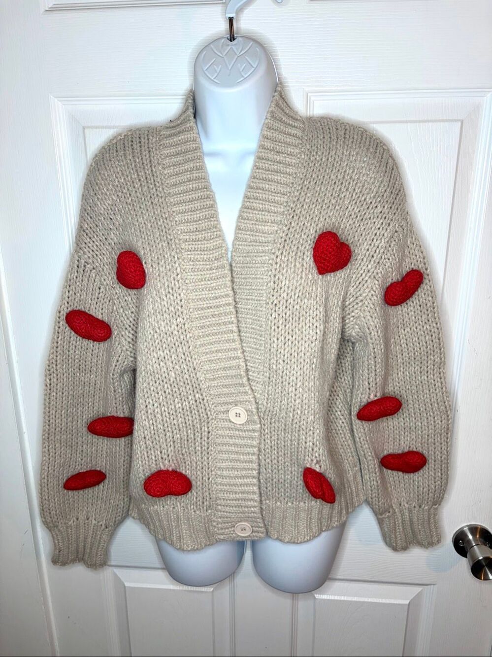 Brown sweater with hearts